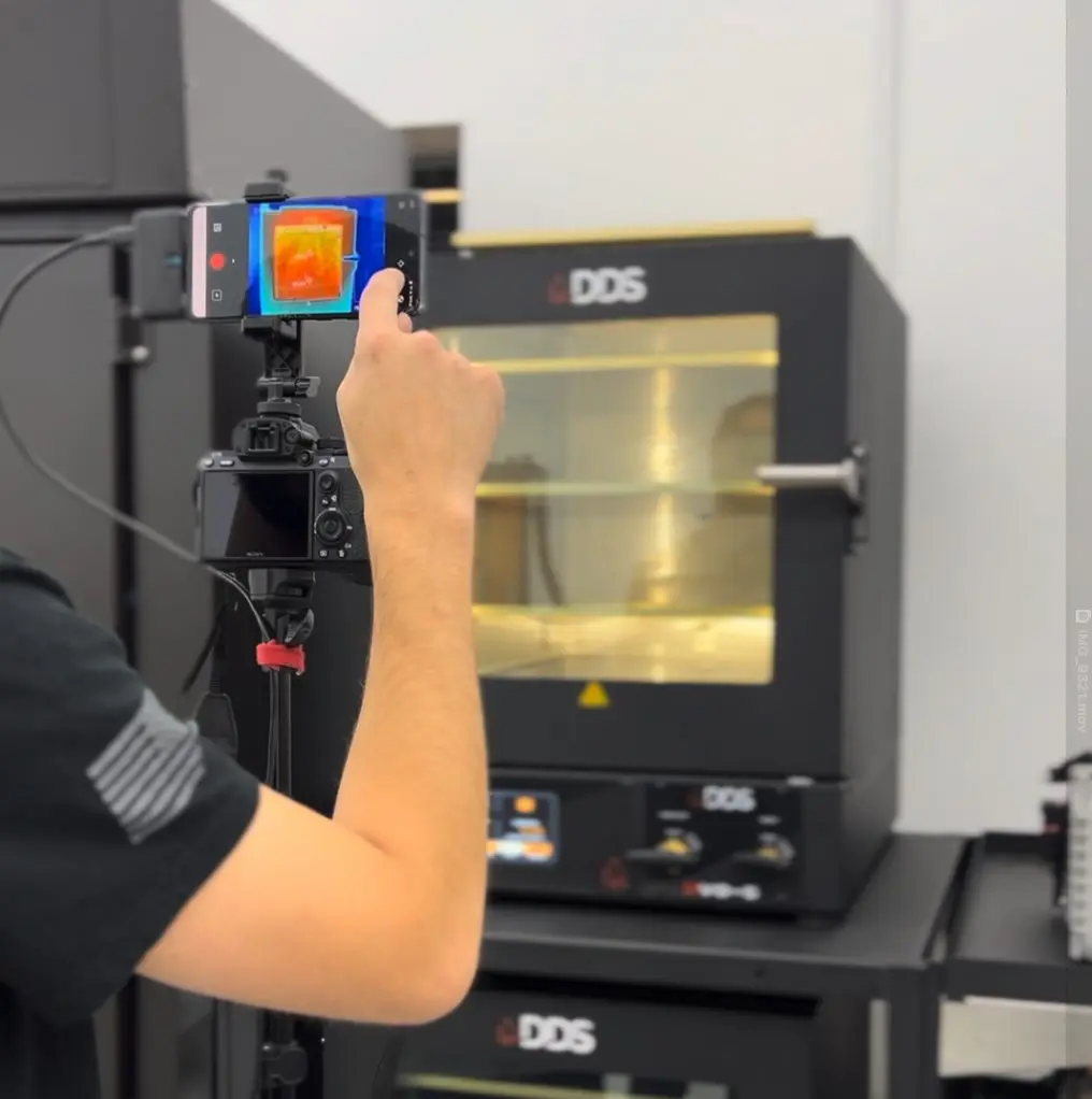 Thermal camera testing a DDS vacuum oven